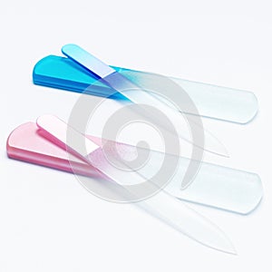 glass nail files on white background