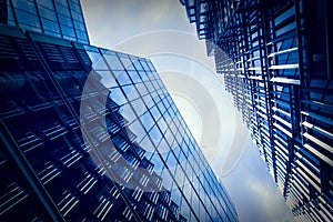 Glass office buildings with cloudy sky