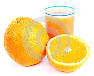 Glass of orange juice and a half of fruit isolated