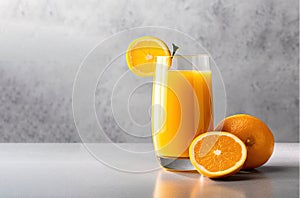 Glass of Orange juice with orange sacs and sliced fruits