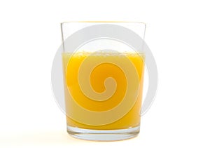 Glass of orange juice on white background.