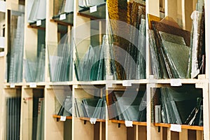 Glass panes in a glazier workshop. Industry