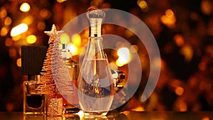 Glass perfume bottle gold bokeh fir tree hd footage