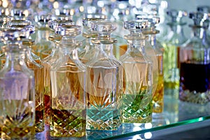 Glass perfume bottles based oils.A Bazaar, market.Aroma oils, oil perfume in faceted glass vessels.