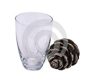 Glass and pine cone