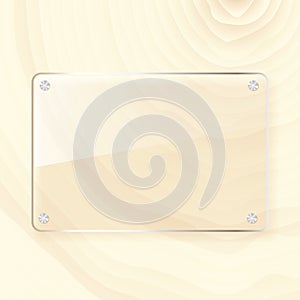 Glass plate on wood background