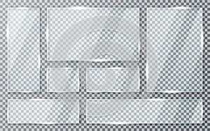 Glass plates set on transparent background. Acrylic and glass texture with glares and light