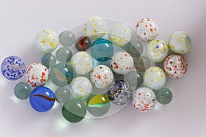 Glass playing marbles different colors.