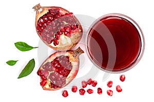 A glass of pomegranate juice with fresh pomegranate fruits isolated on white background. Top view. Flat lay