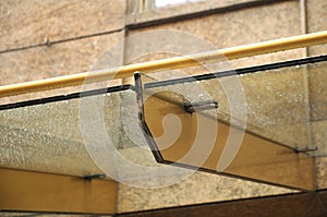 Glass porch at business building on rainy day