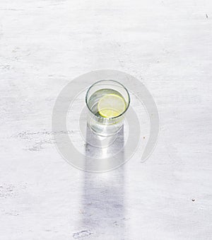 Glass of pure water with slice lime