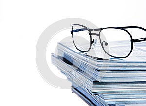 Glass put on magazine stack