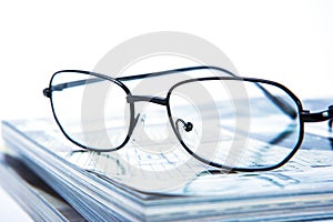 Glass put on magazine stack