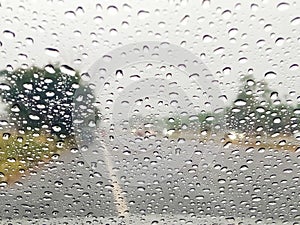 glass rain drops texture pattern weather road traffic rainy season heavy rain storm