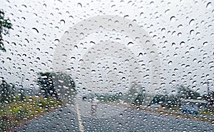 glass rain drops texture pattern weather road traffic rainy season heavy rain storm