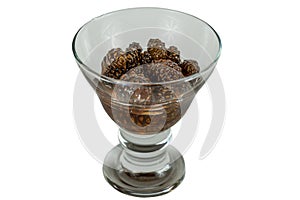 Glass ramekin of jam made from pine cones