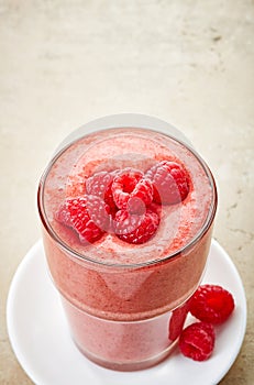 Glass of raspberry and banana smoothie