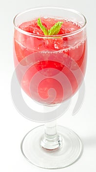 Glass of Red Ripe and Sweet Watermelon Juice on White