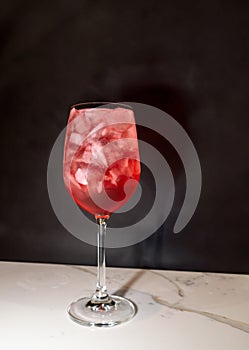 Glass of Red Sangria with Abstract Ice Cubes