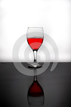 A glass of red water