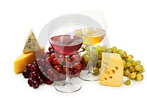 Glass of red and white wine, cheeses and grapes isolated on a white