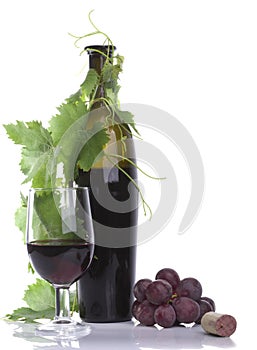 Glass red wine and bottle