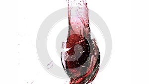Glass of Red Wine Exploding and Splashing against White Background,