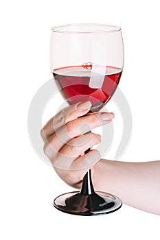 Glass of red wine  in female hand