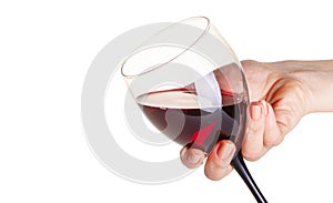 Glass of red wine in female hand