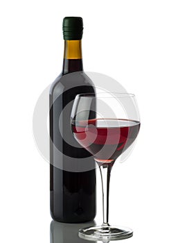 Glass of Red Wine with full bottle on White background