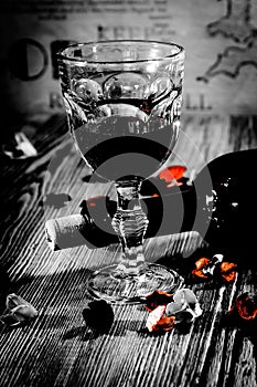 Glass of red wine the removed in interesting style, beautiful still life on kitchen