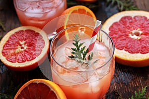 Glass of refreshing alcohol drink with orange juice, vodka or white rum served with ice orange slice.