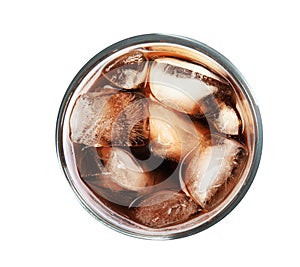 Glass of refreshing cola with ice cubes on white, top view