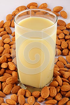 Glass of refreshing and healthy badam milk photo