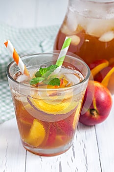 Glass of refreshing peach iced tea