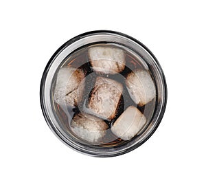 Glass of refreshing soda water with ice cubes isolated on white, top view