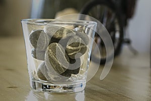 A glass of rocks/stones