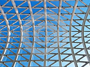 Glass roof with blue sky background