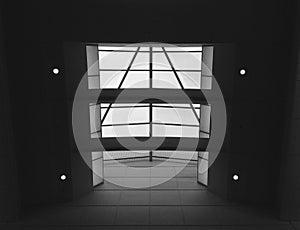 Glass roof with four spotlights in black and white