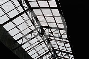 Glass roof of modern building with background of clear blue sky