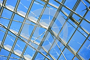 Glass roof of a modern building. Close-up view of the transparent roof.