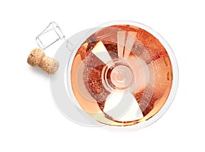 Glass of rose champagne and cork plug