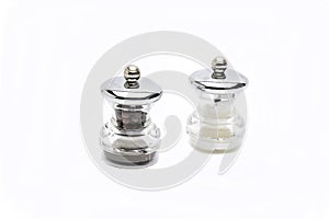 Glass salt and pepper shakers isolated