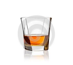 Glass of scotch whiskey isolated on a white background