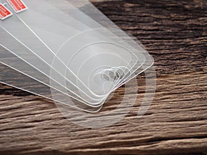 Glass screen protector on the old wooden board in the concept of protection smartphones