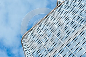 Glass skyscraper building against sky background square illustration