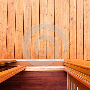 Glass slider door opening to wooden deck or porch