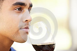 Glass, smell and aroma with man for wine tasting, appreciate and farm and thinking of taste. Vineyard, organic and