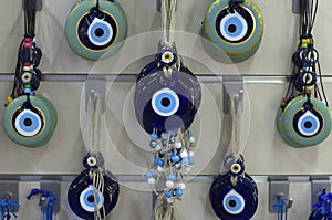 Glass souvenirs called Fatima`s eye or Nazar which protect against the evil eye