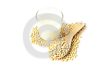 Glass soy milk and soy beans with heart shape on white background, food and drink healthy concept